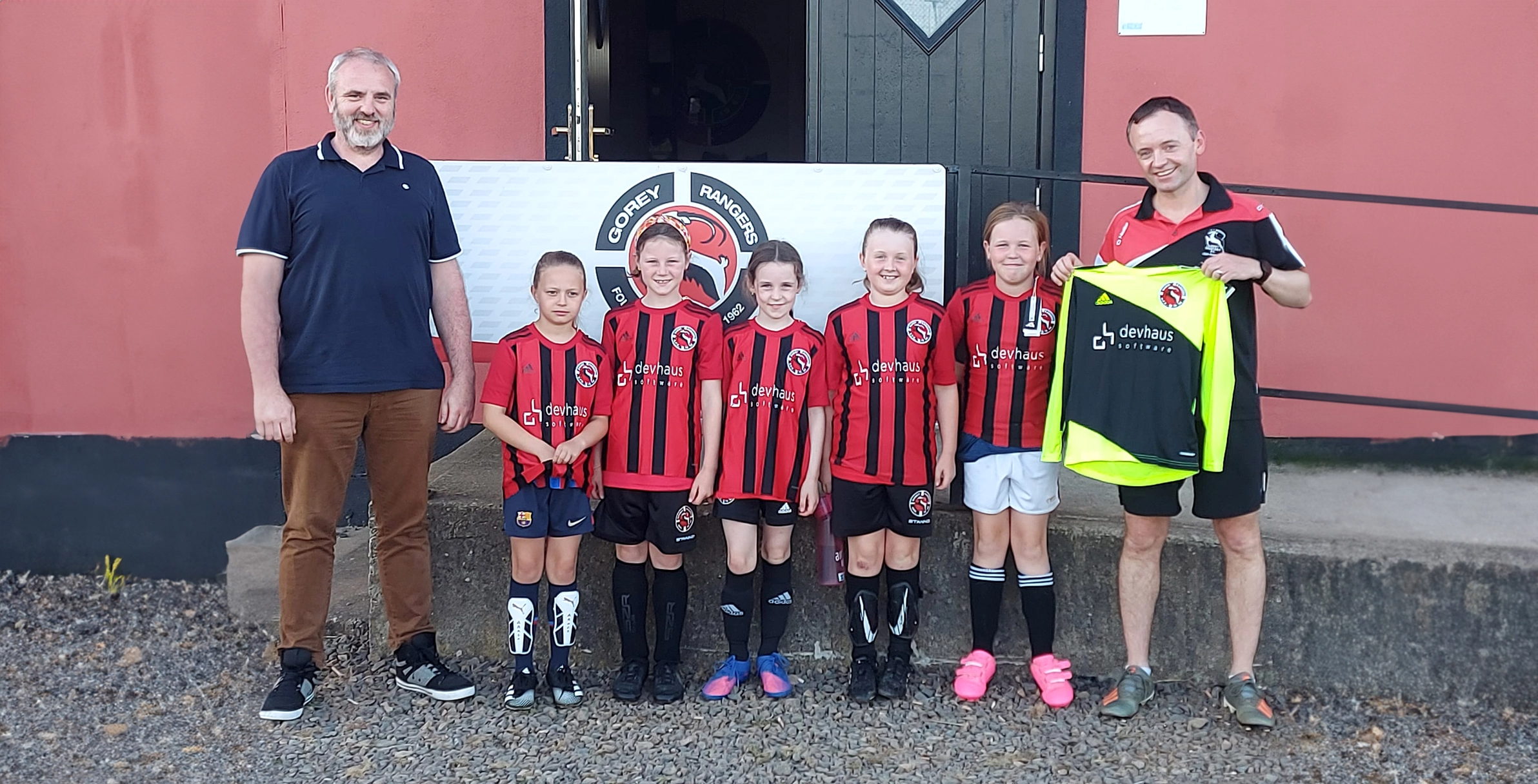 Dave from Devhaus presenting jerseys to Gorey Rangers soccer team